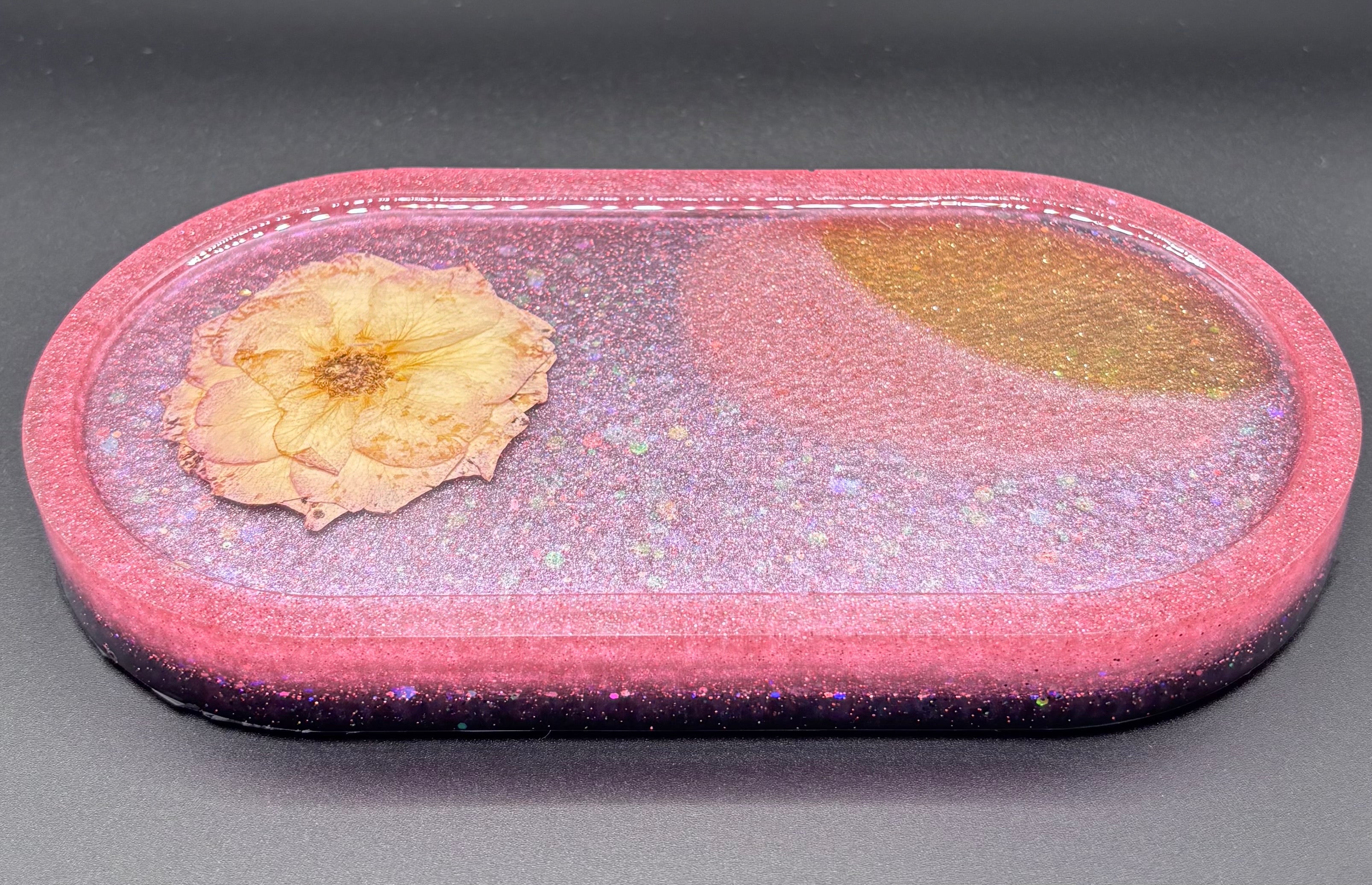 Pink and lavender glitter resin tray with pressed cream flower